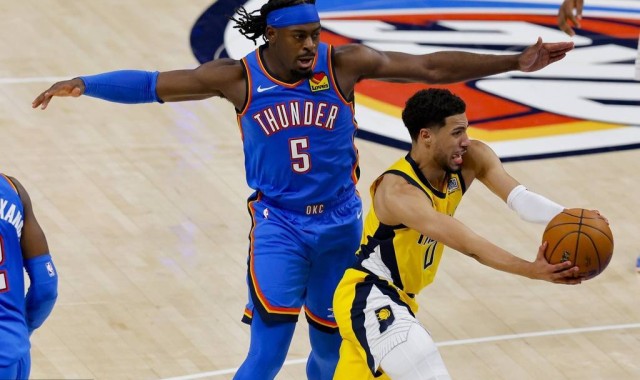 当多尔特对位哈里伯顿时 后者命中率20%仅有4次助攻