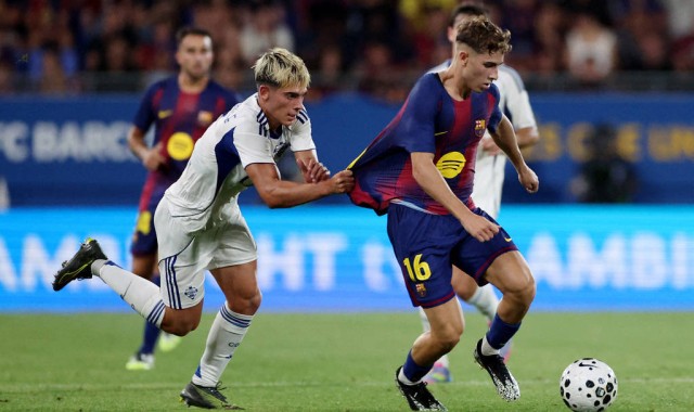 西甲首轮风波：巴萨争议进球引爆舆论，裁判成焦点